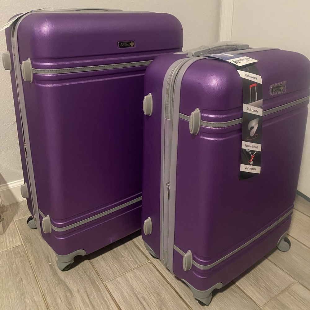 2 Travel rolling suitcases